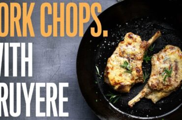 Grilled pork chop with a cream, mustard cheese melt