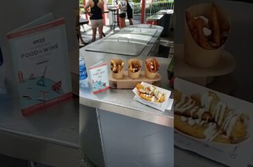 epcot international food and wine festival having a French fry flight so good!