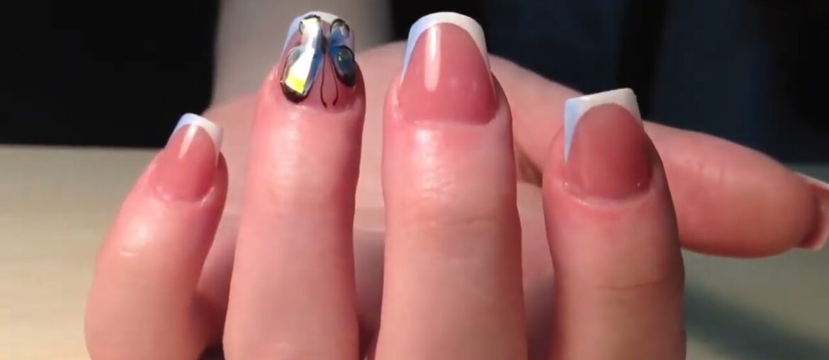 Rodent graduate girl received a transformation of stubs into chic long gel nails with a design