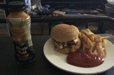 Royal Red Robin burger with French fries , orange juice from Red Robin gourmet burger & brews Food R