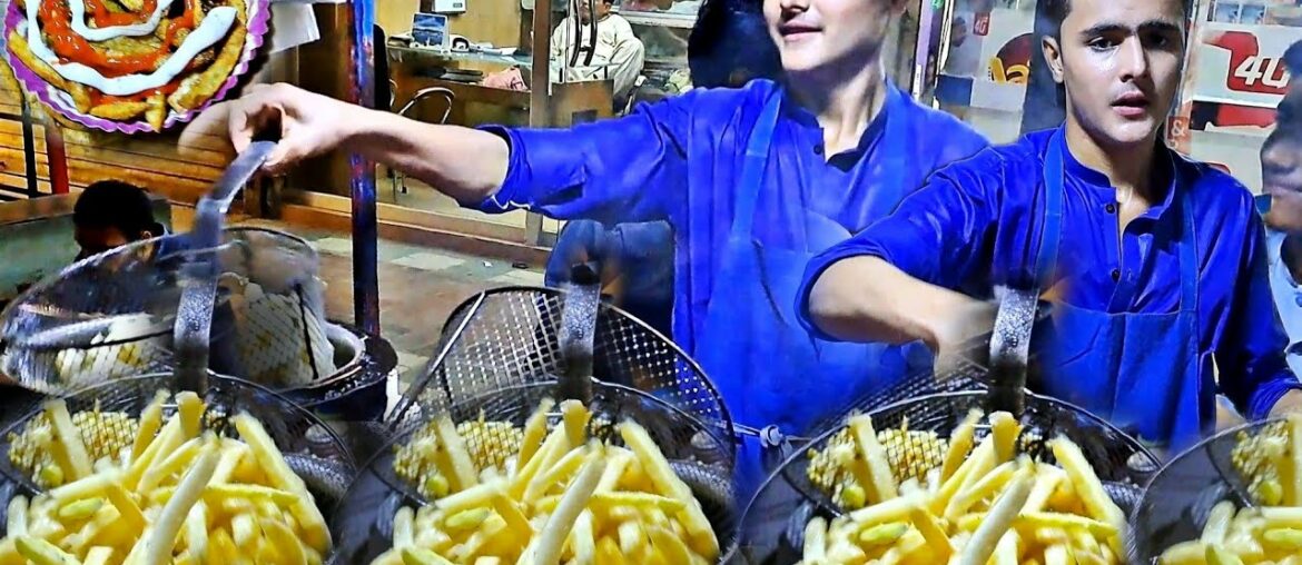 14 Years Old Hardworking Kid Making French Fries on Street Food Karachi. Pakistani Street Food Fries