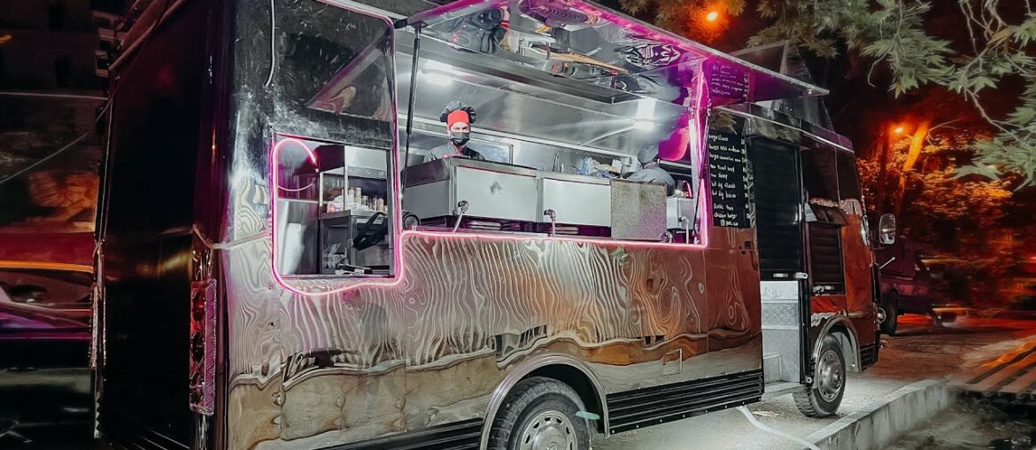 Food truck only one dollar – the best black burger with a special bun Food truck only one dollar - the best black burger with a special bun