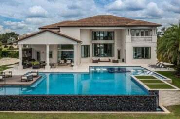 $3,790,000! Tastefully professional decorated home with resort style backyard in Windermere, FL