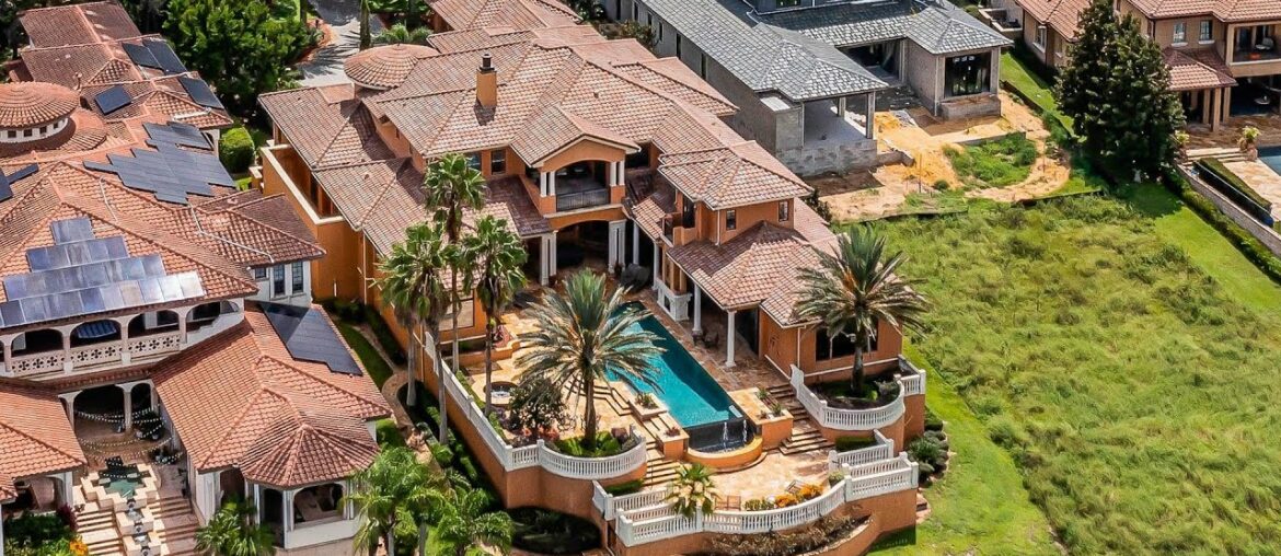 $4,750,000! Magnificent lakefront Italian estate with a stunning infinity pool in Montverde, FL