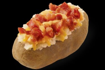 What Really Makes Wendy's Baked Potatoes So Delicious