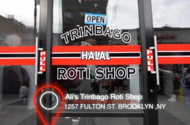 Eating at Ali's Trinbago Roti Shop in Brooklyn, NY