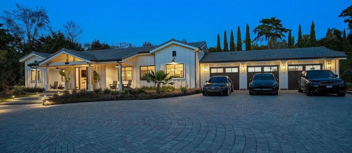 $5,850,000! A thoughtfully designed home on a lushly landscaped Covenant lot in Rancho Santa Fe