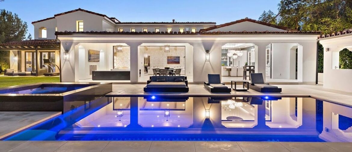 $15,995,000! Top-grade home in guard-gated Crystal Cove offers lavishly redesigned exterior spaces