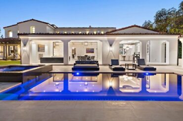 $15,995,000! Top-grade home in guard-gated Crystal Cove offers lavishly redesigned exterior spaces