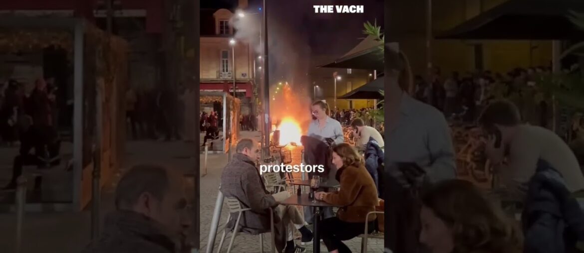 French diners drink wine in fire and protestors eat fancy #shorts