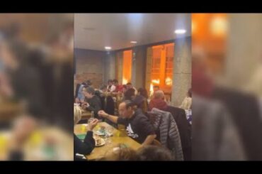 France protests: Did diners continue eating their meal surrounded by flames?