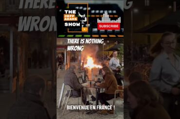 #shorts French diners sip wine as fires break out in protest against Macron