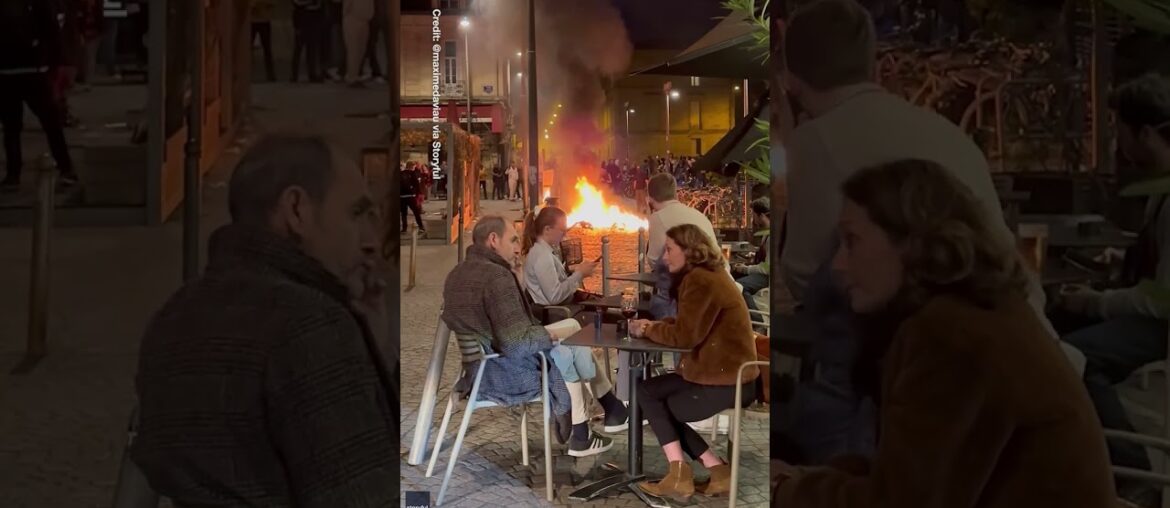 VIVA LA LIBATION! French Diners SIP WINE Despite Raging Protest FIRE