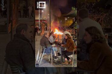 VIVA LA LIBATION! French Diners SIP WINE Despite Raging Protest FIRE