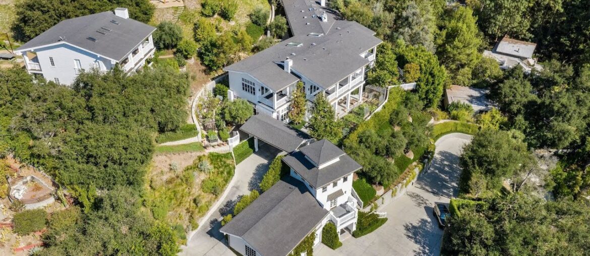A $25 Million Beverly Hills compound with over 16,000SF of living spaces and a long private driveway