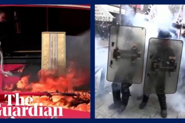 Protesters set fire to restaurant favoured by Macron and clash with police in Paris