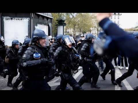Riot police face off with protesters in Paris Riot police face off with protesters in Paris