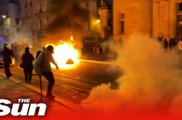 Paris streets continue to burn as Macron addresses pension reform protests