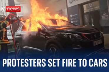 France: Police fire tear gas as protesters set fire to cars and buildings