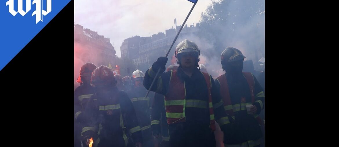 French march for workers' rights in May Day protests