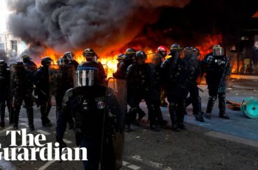 Police clash with protesters across Paris who threw petrol bombs in violent Labour Day march