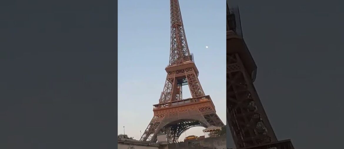 Crusing by the Eiffel Tower in the Seine River | Paris, France Crusing by the Eiffel Tower in the Seine River | Paris, France