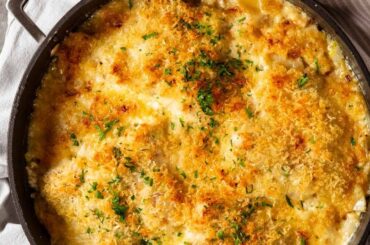 Creamy baked fish on potato gratin