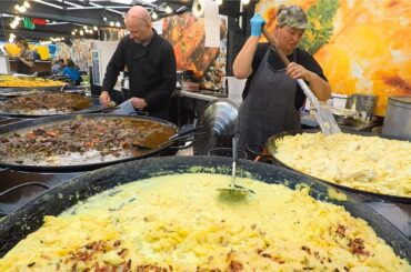 Street Food from France. Huge Pans of Beef 'Bourguignonne', 'Duck Confit', Tartiflette & more