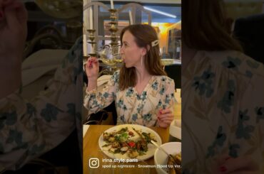 Elegant restaurant drinking white French wine flower dress pearl femme fatale fashionista