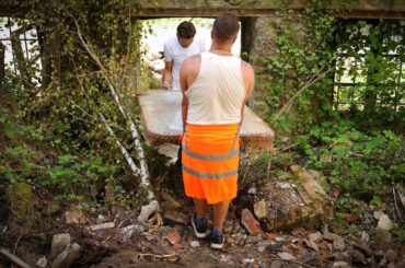 300 bricks, two men, and a water tank.