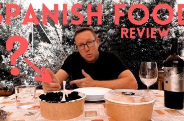 Spanish food - Tasty black tomato seafood soup