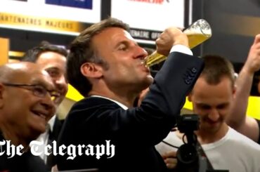 Emmanuel Macron downs a beer with French rugby champions Toulouse