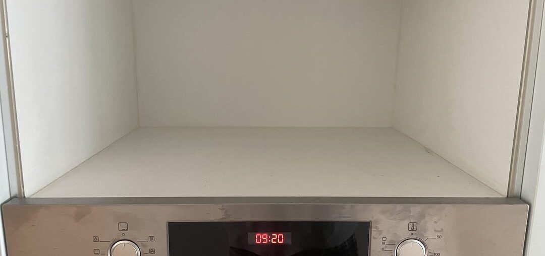 Is it possible for me to create a hole at this location in order to install my external microwave?