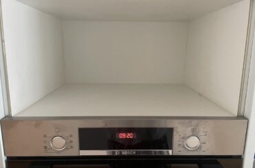 Is it possible for me to create a hole at this location in order to install my external microwave?