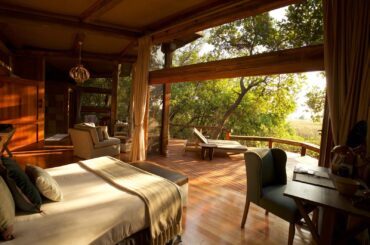 Bedroom suite with balcony overlooking jungle [1600 x 1067] Botswana, Africa.