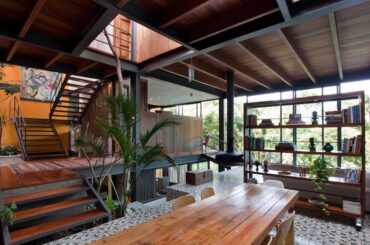 Multi level use of wood and steel industrial inspired design of dining and living [1053 x 663] Guadalajara, Mexico