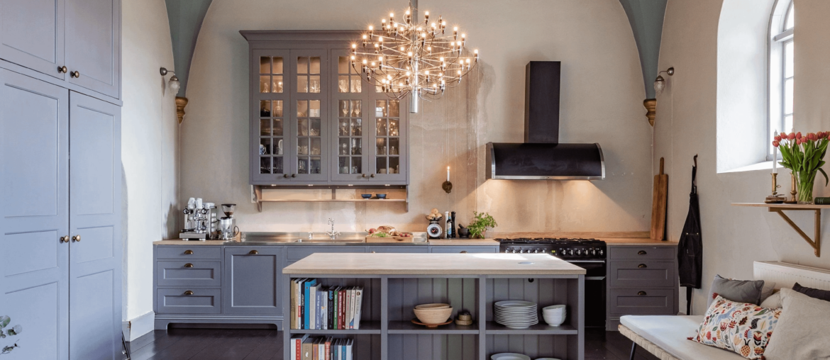 Kitchen under a vaulted ceiling in a century-old church that was converted into a residence, Norrmannebo, Kungälv Municipality, Västra Götaland County, Sweden