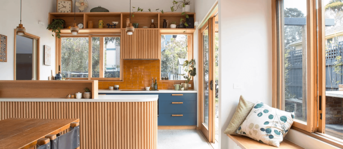 Kitchen and dining space with a window seat in a renovated and extended bungalow, Brunswick West, Melbourne, Victoria, Australia. Credit to u/maniaforbeatles