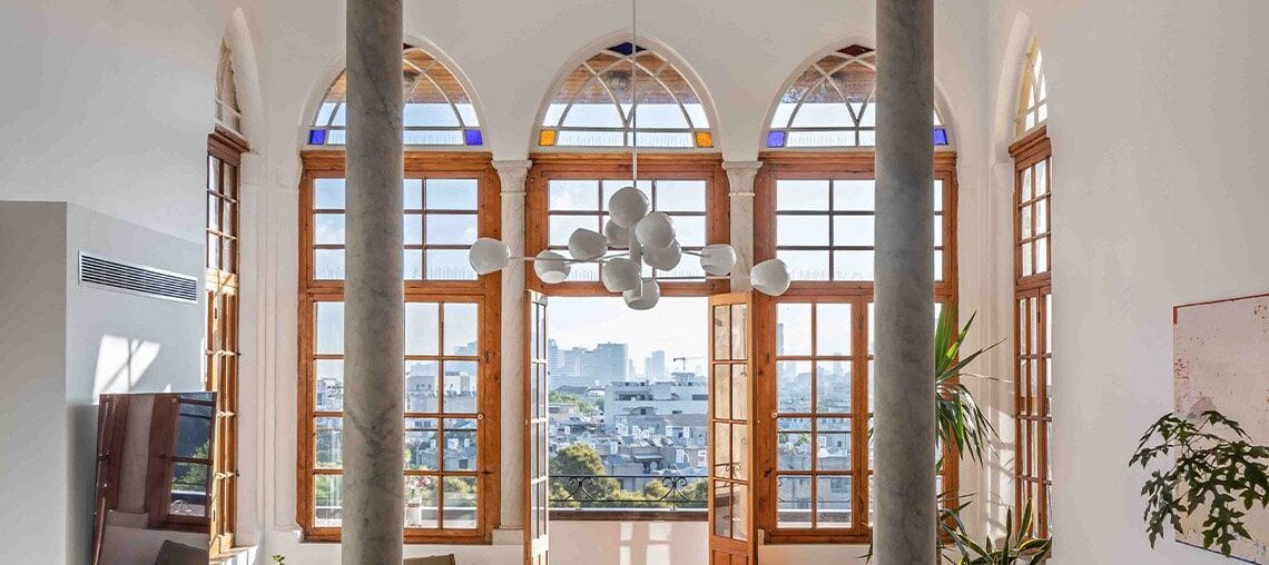 Living room opening to the balcony in a renovated 19th-century Ottoman-era house, Jaffa, Tel Aviv, Israel [1140x1600]