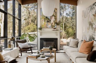 Living room with floor-to-ceiling windows in a renovated residence originally designed by prominent Australian architect Robin Boyd in 1956, Warrandyte, Melbourne, Victoria, Australia [1653x2133]