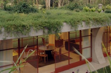 Guesthouse living spaces under a vegetated rooftop in Tintenbar, Far North Coast of New South Wales, Australia [1545x2000]