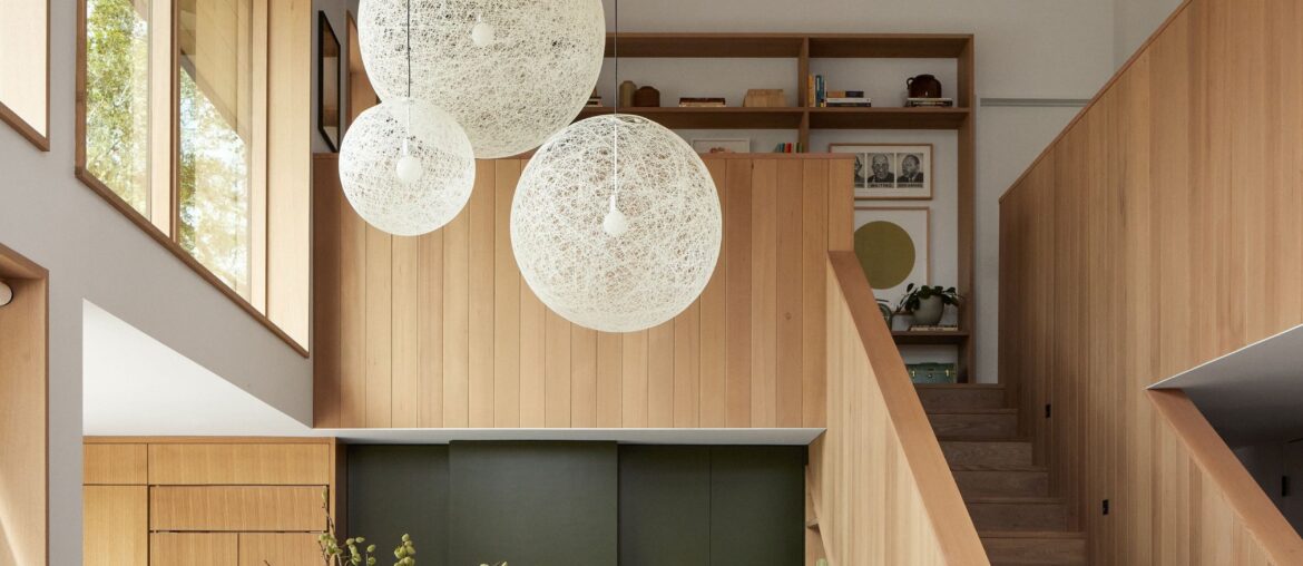 Double-height kitchen and dining space in a beach house, Pebble Beach, Monterey County, California [2500x3333]