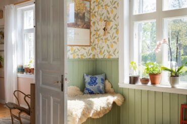 Seat next to a window in a 1926 summer house full of second-hand furniture, island of Öland, southern Sweden [1350x1800]