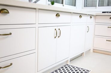 White kitchen with inset doors and drawers