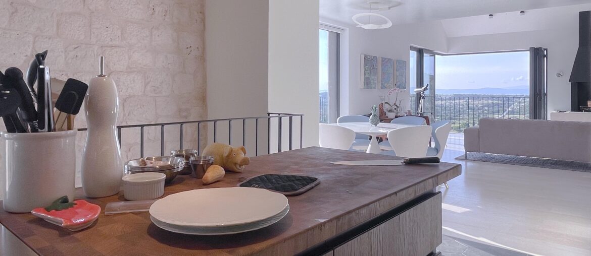 The view of the living and dining room from the kitchen (3964 x 2230)