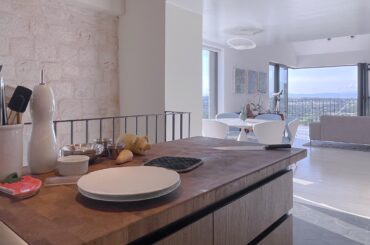 The view of the living and dining room from the kitchen (3964 x 2230)