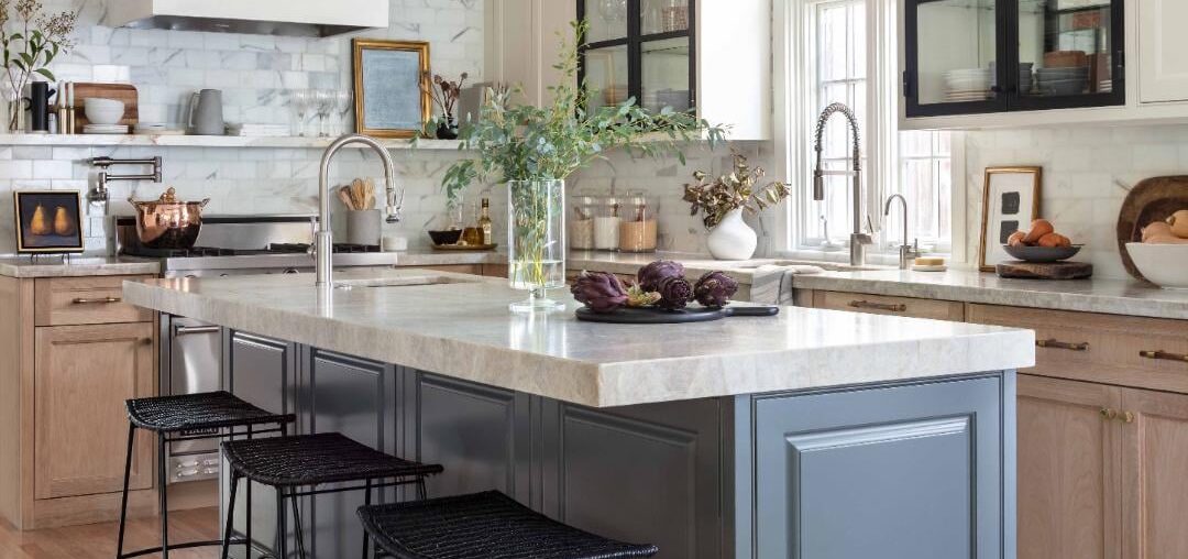 Renovated kitchen with arched sink window and glass door cabinets, West University Place, Texas