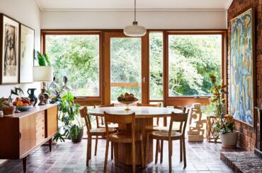 Timber and brick in the dining space of a renovated 80s home, Macedon Ranges, Central Victoria, Australia [2600x1460]