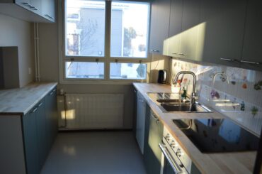 Or remodeled galley kitchen with a serving hatch to the dining room