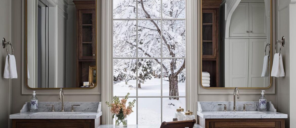 Bathroom with a window between two vanities in a Utah home [1440x1799]